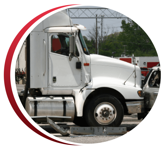 a white semi truck thats been in an accident